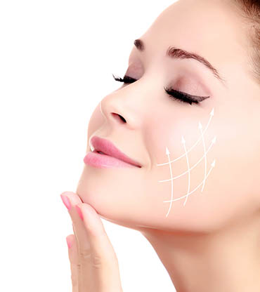 Young female with clean fresh skin, white background